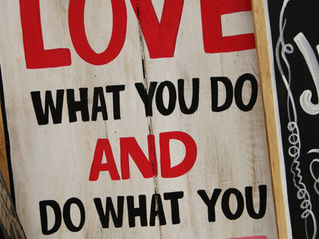 A sign reads "Love what you do"