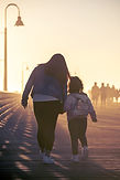 Mom and daughter walking together