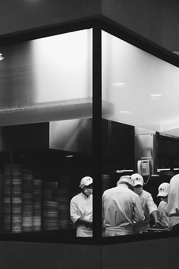 chefs in a restaurant kitchen