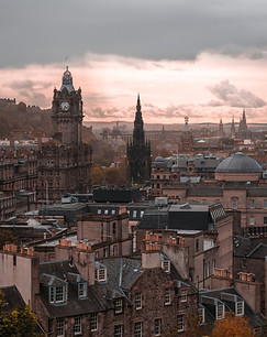 A skyline photo at dusk of a European city 