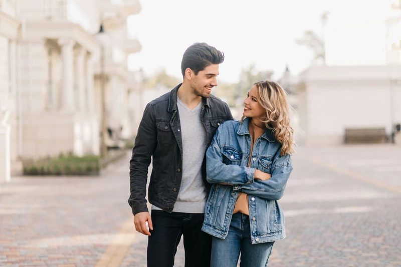 confident man and woman smiling