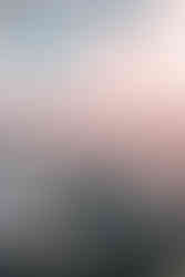 image from an airplane showing several clouds in the sky as a representation of air