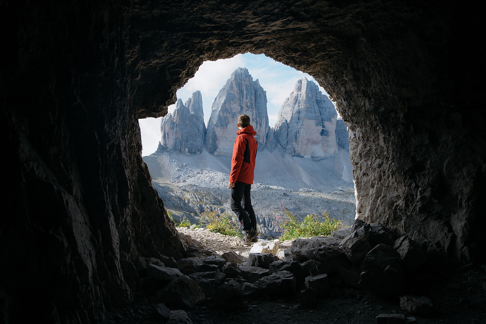 Man emerging after being in a cave for a long time