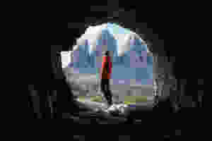 Man emerging after being in a cave for a long time