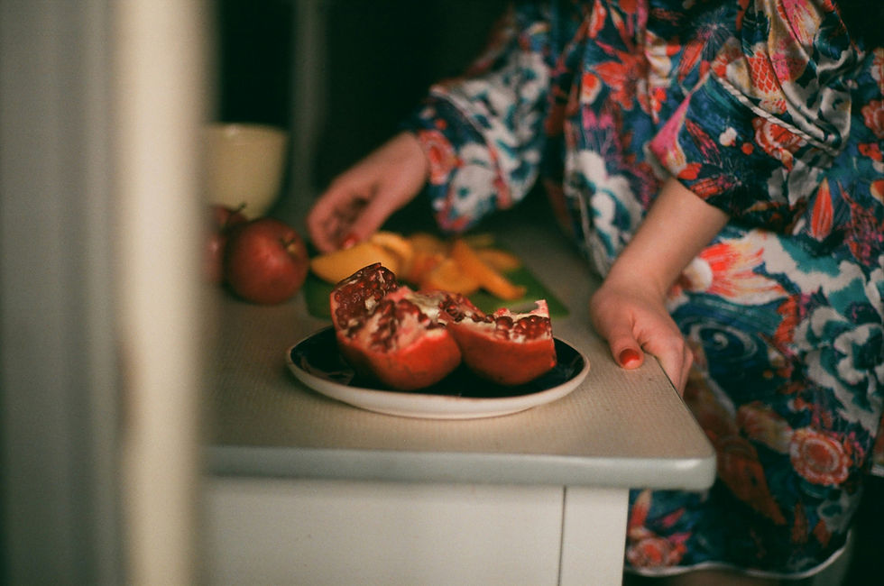 Eye-level view of a colourful bowl of fresh vegetables and fruits
