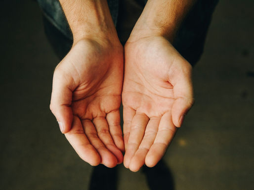 man's hands outreached