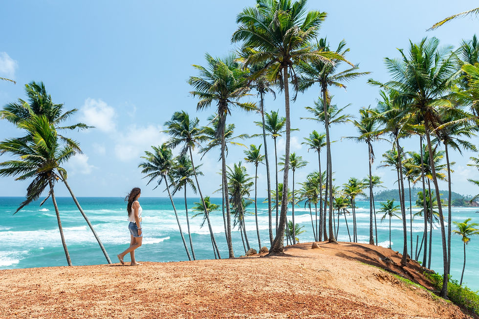 Woman at Coconut Tree Hill, Travel Guide Sri Lanka. Image by Sebastian Latorre