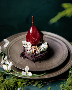 A decadent dessert: Port Poached Pear Chocolate Cake with Blue Cheese