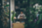 Woman at her flower & plant shop