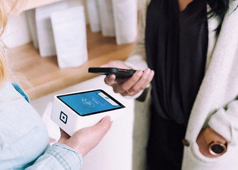 Customer making payment. Image by Christiann Koepke