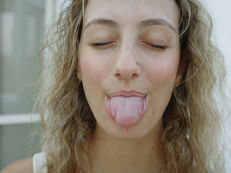woman sticking out her tongue