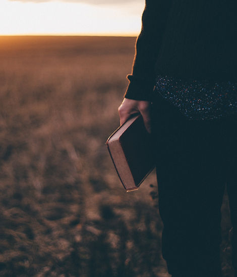 Woman Praying and Reading Scriptures