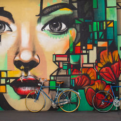 Colorful graffiti portrait with bicycles
