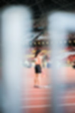 Woman standing at the start of a race