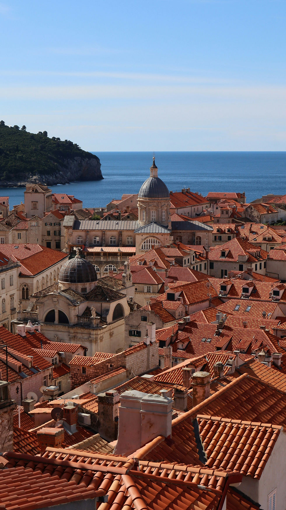 Terracotta rooftops and a church dome in Dubrovnik