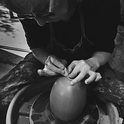 Throwing on the pottery wheel in Intro 2.0 six week class at Clayroom San Mateo