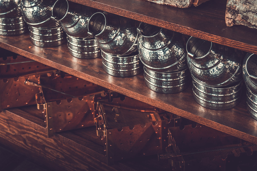 Picture of Turkish Coffee sets organized on a wooden shelf