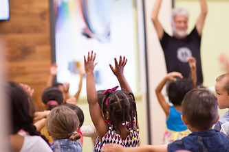 children with their hand up