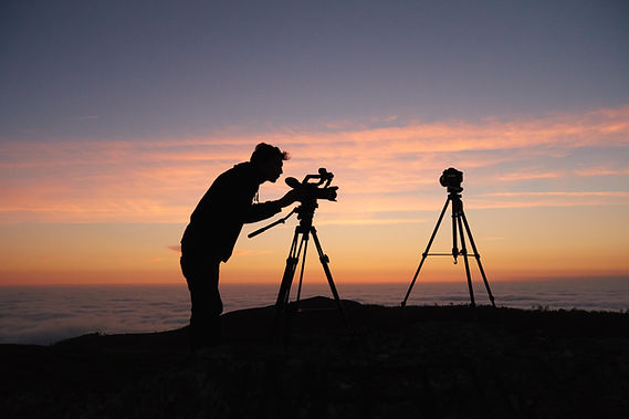 a picture of a man with a video camera