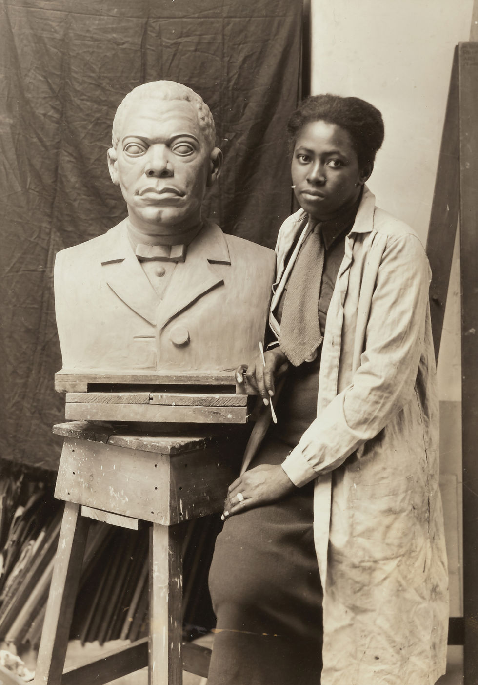 Photo Source: New York Public Library African American Artist Selma Burke with Bust of Booker T Washington 1935" (Wix Unsplash)
