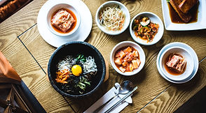 Bibimbap with kimchi and Korean side dishes