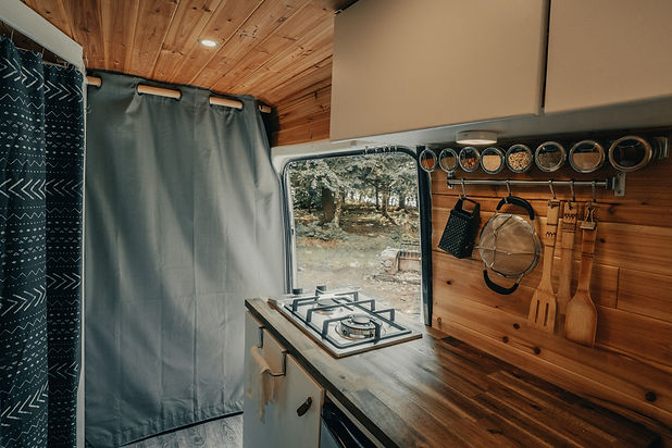 Bathroom with a shower and a window, providing natural light and ventilation