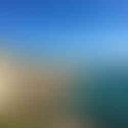 The ramparts of Saint Malo in Brittany, France, overlooking the coastline on a clear sunny day