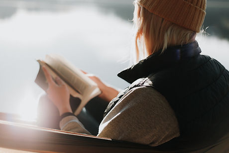 Person sitting reading Bible