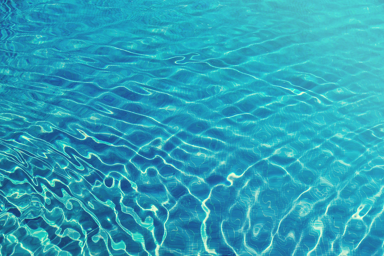 Blue pool water rippling