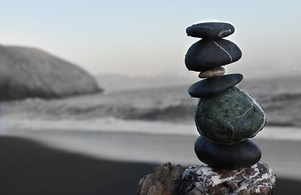 A peaceful arrangement of stones stacked in balance.