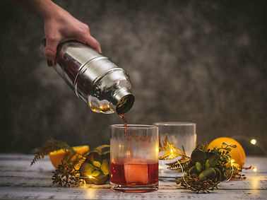 Pour Cobbler cocktail shaker into a glass