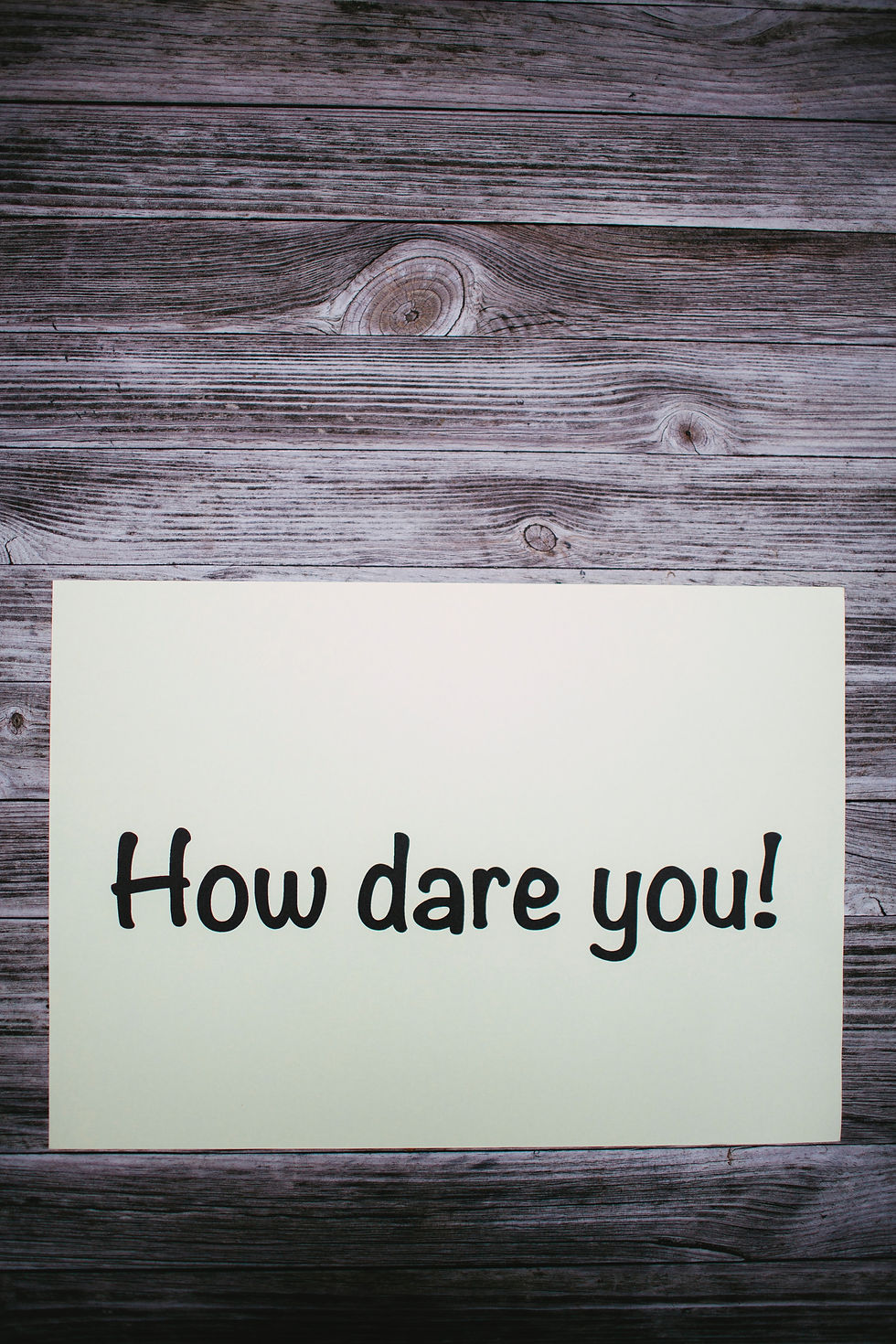 emotional wounds - sign saying how dare you