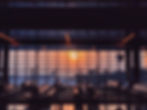 Interior view of an empty boarding area in the airport at sunset