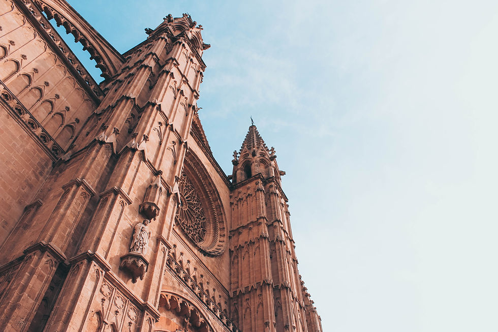 large cathedral facade pointing to sky