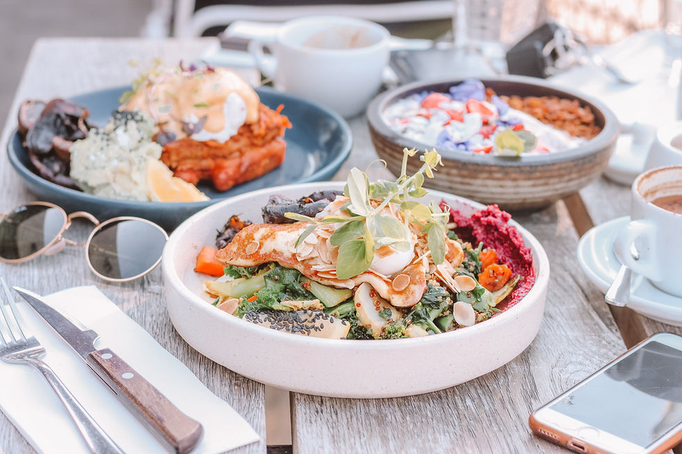 three dishes of food with vegetables