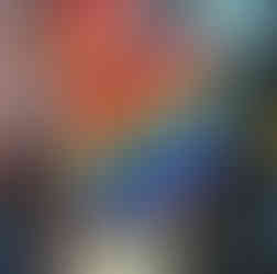 Rainbow pride flag that says, "queer & proud"