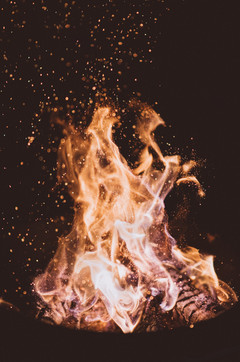 flames against a black background as a representation of fire