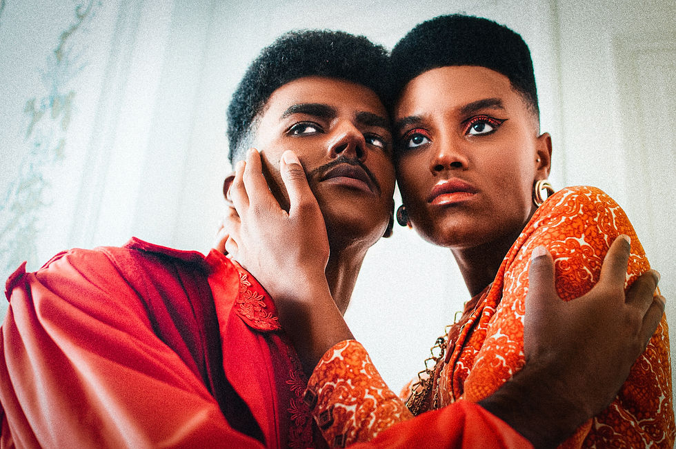 Black models posing.