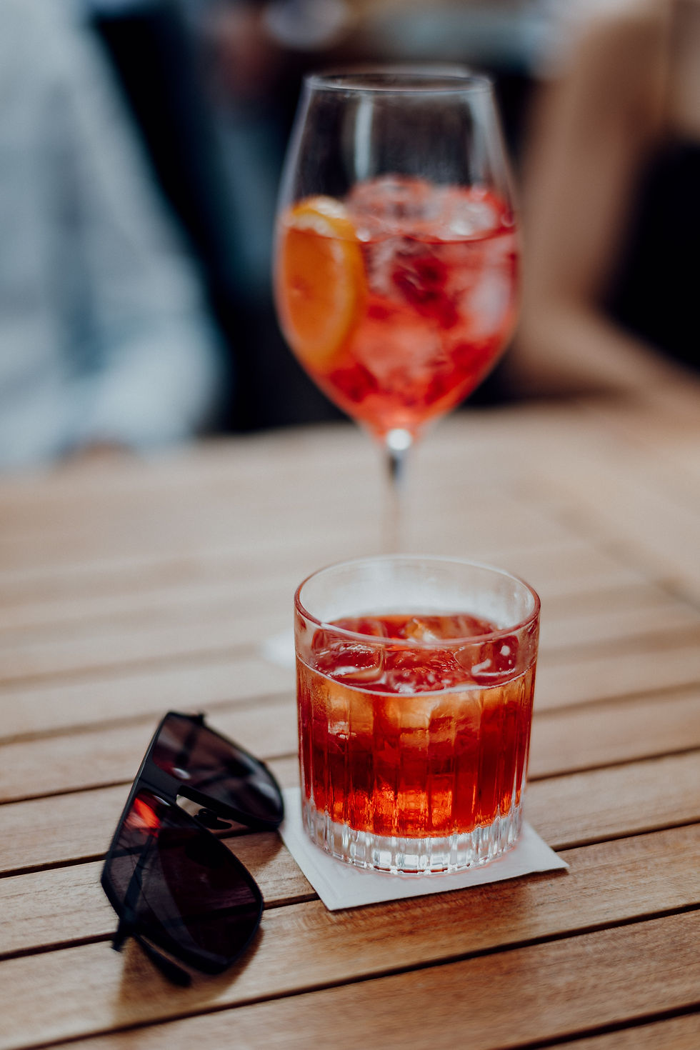 Negroni & Aperol Spritz on a table