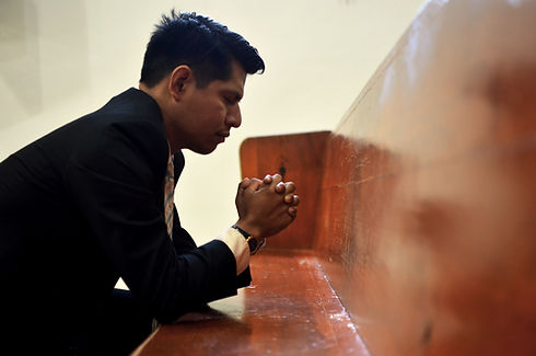 Man praying in Church