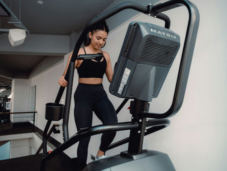 A woman on a stairmaster
