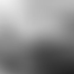 Black and white desk with papers and writing tools — midlife recalibration psychology