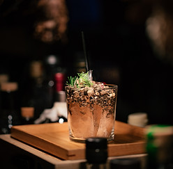 Cocktail sitting on a bar