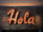 A sign with the word Hola that in Spanish means Hello