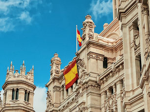 Spanish business and spanish flag flying