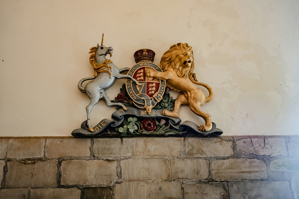 High angle view of a Scottish flag with a unicorn emblem fluttering in the wind