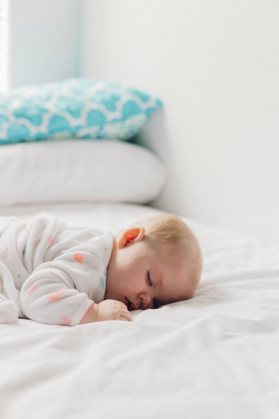 Small, white baby sleeping