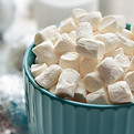 Small marshmallows in a bowl - Image by Serafima Lazarenko