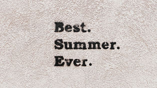 Text on a textured white wall reads "Best. Summer. Ever." in bold black letters, conveying a joyful and nostalgic mood.