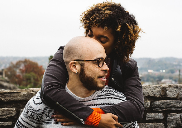 Image by Justin Follis of a couple embrasing